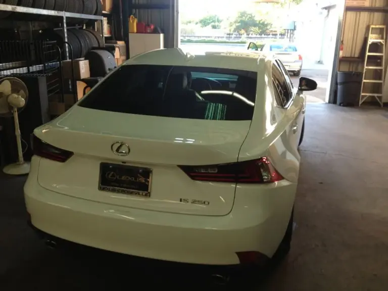 White Lexus IS 250 from behind, rear window tinted